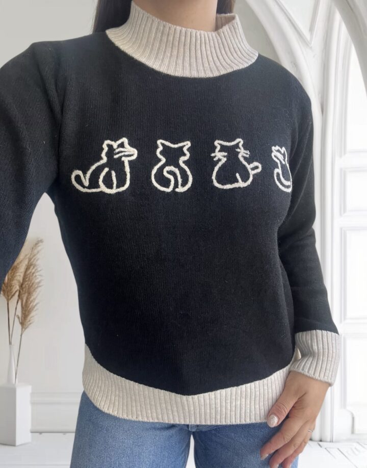 SWEATER CATS NEGRO CON CUELLO CRUDO